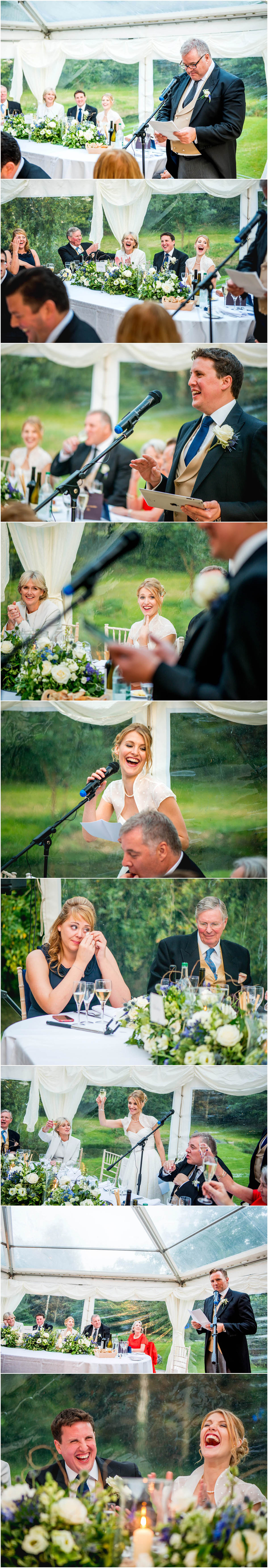 Speeches at a Dorset Wedding in Cerne Abbas with bride and groom speaking and guests cheering.