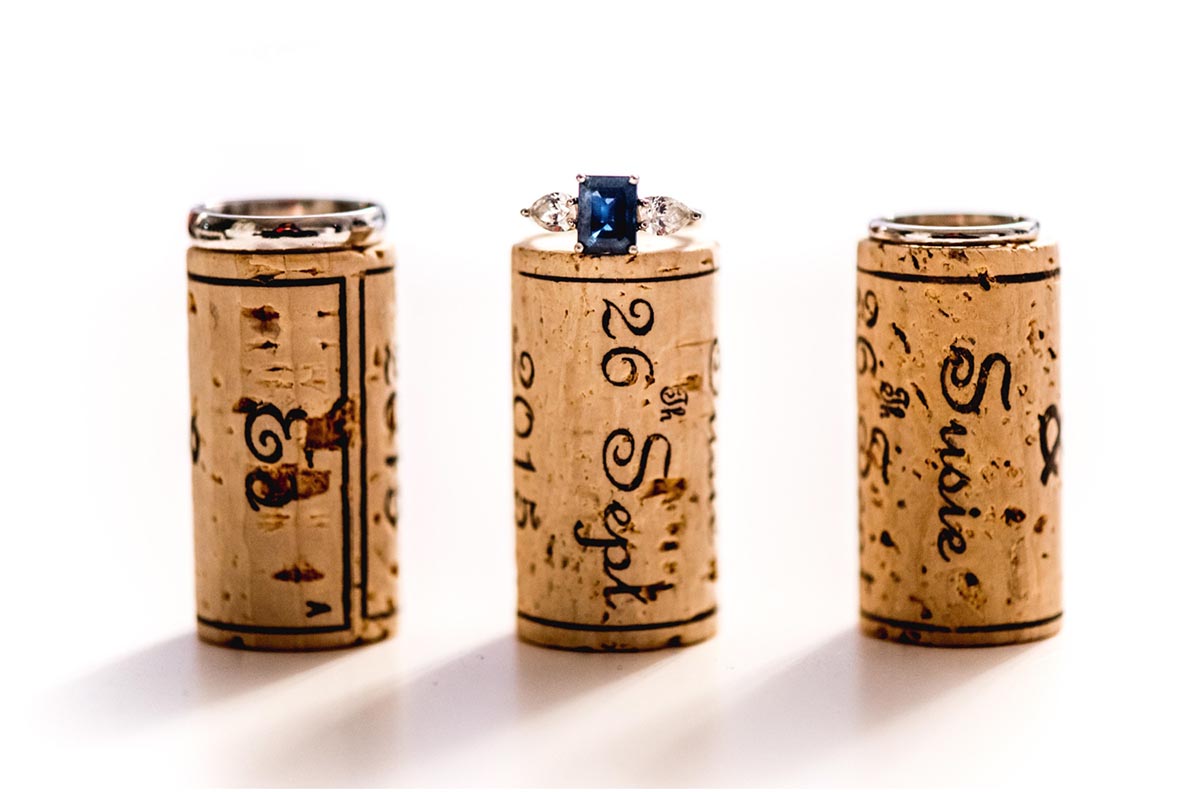 Susie and Ed's Dorset Wedding in Alton Pancras, Dorset, near Cerne Abbas, By Lisa Carpenter Photography, West Midlands, Birmingham based photographer, rings on corks, personalised corks
