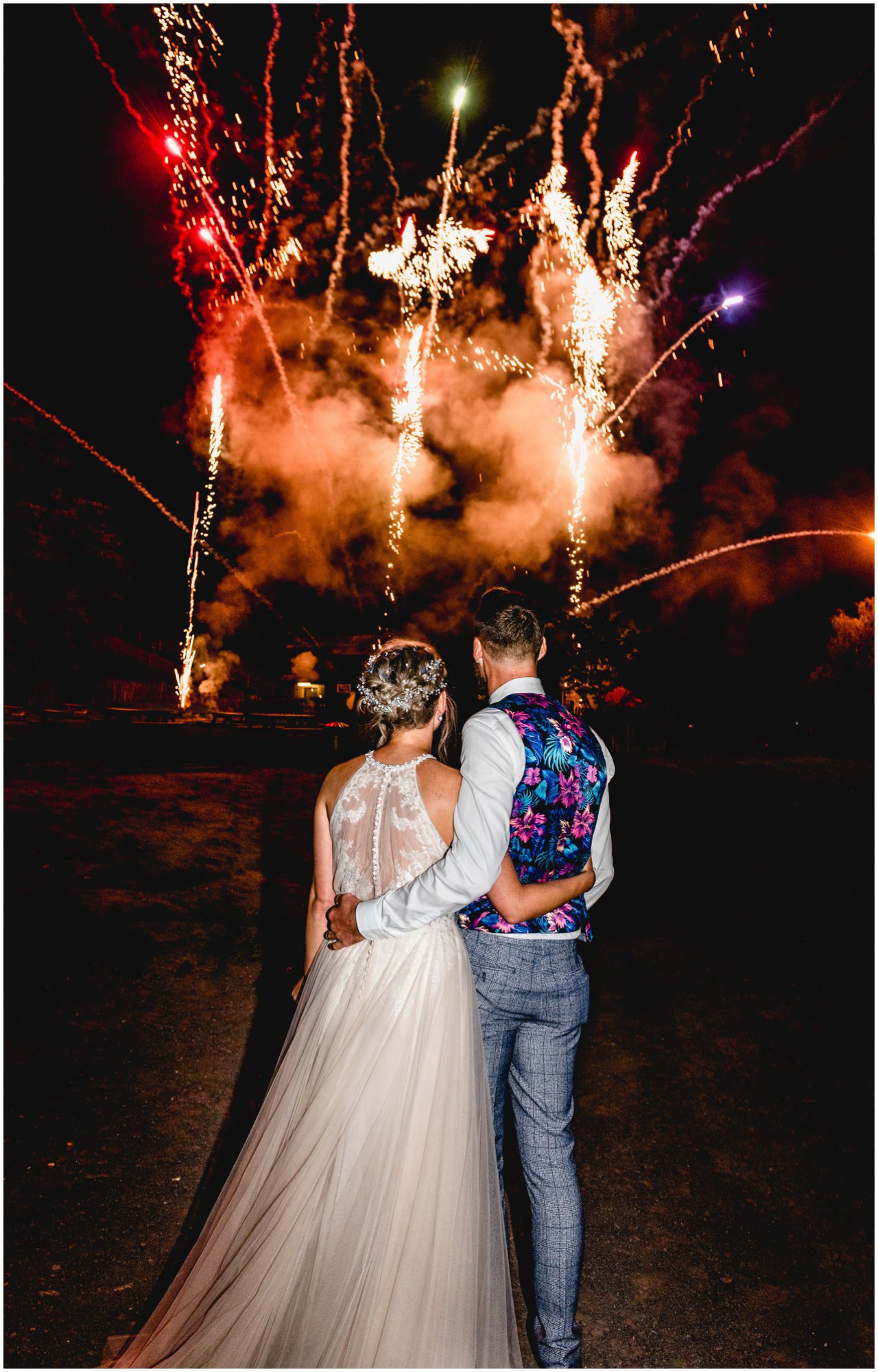 Wedding photo of couple watching fireworks at Blists Hill victorian Town Museum