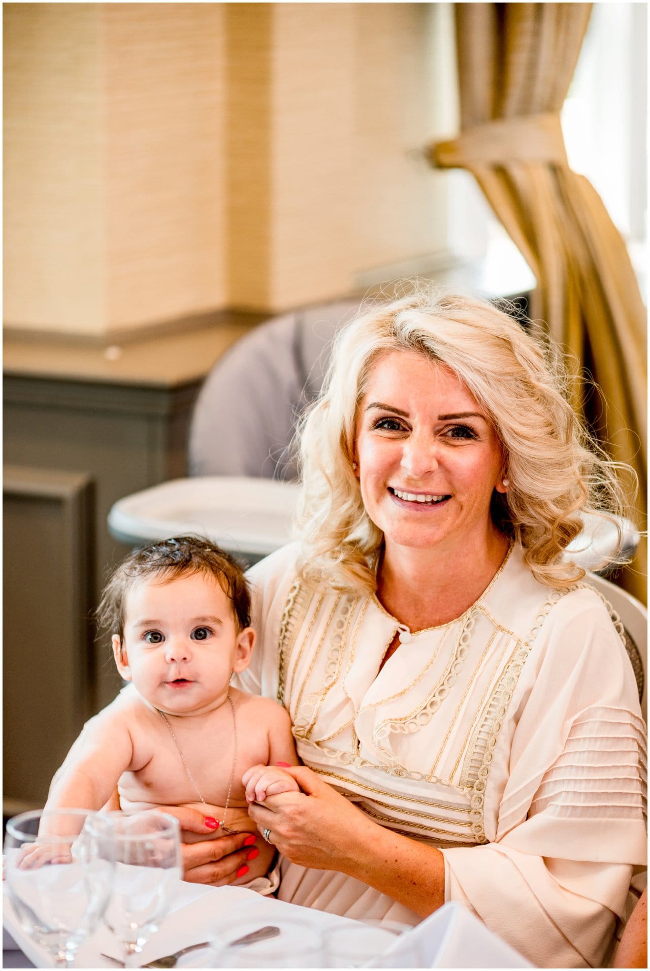 Mom and baby celebrating christening
