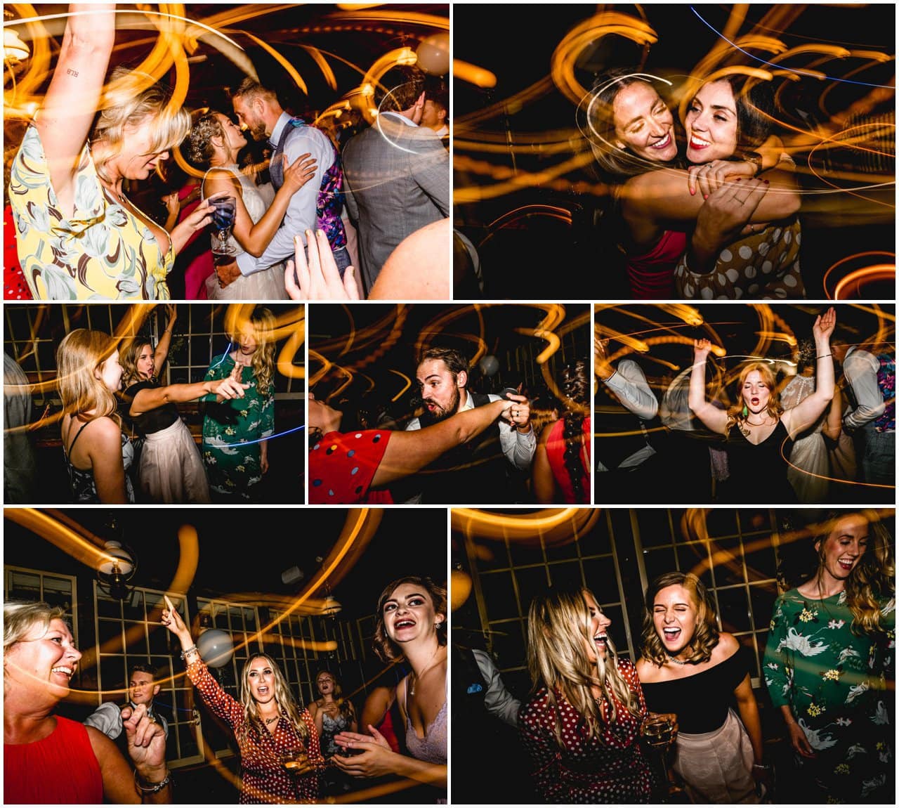 Dancing guests at a wedding reception photographed with light trails