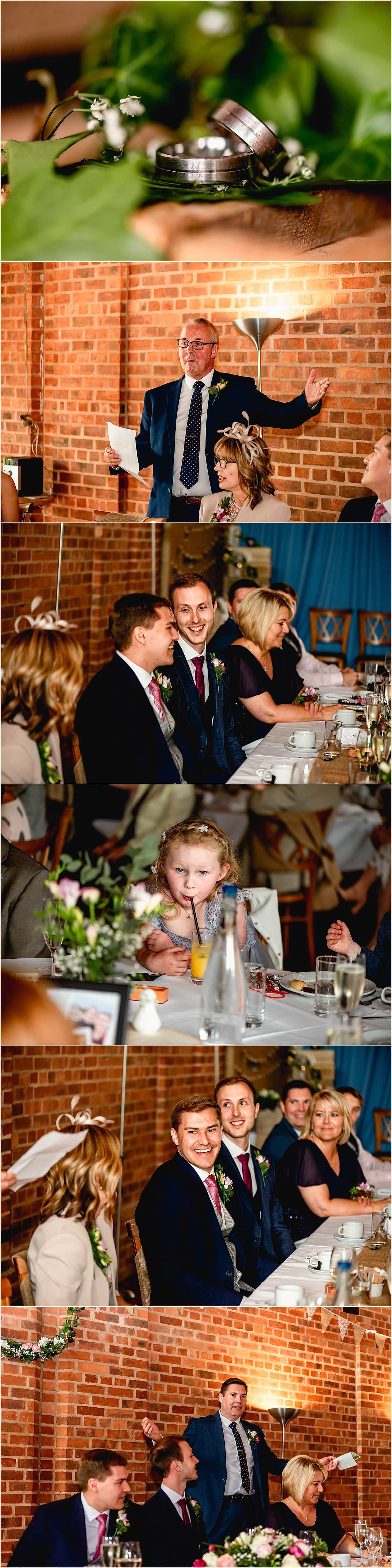 Speeches at a wedding, grooms and guests laughing in appreciation.