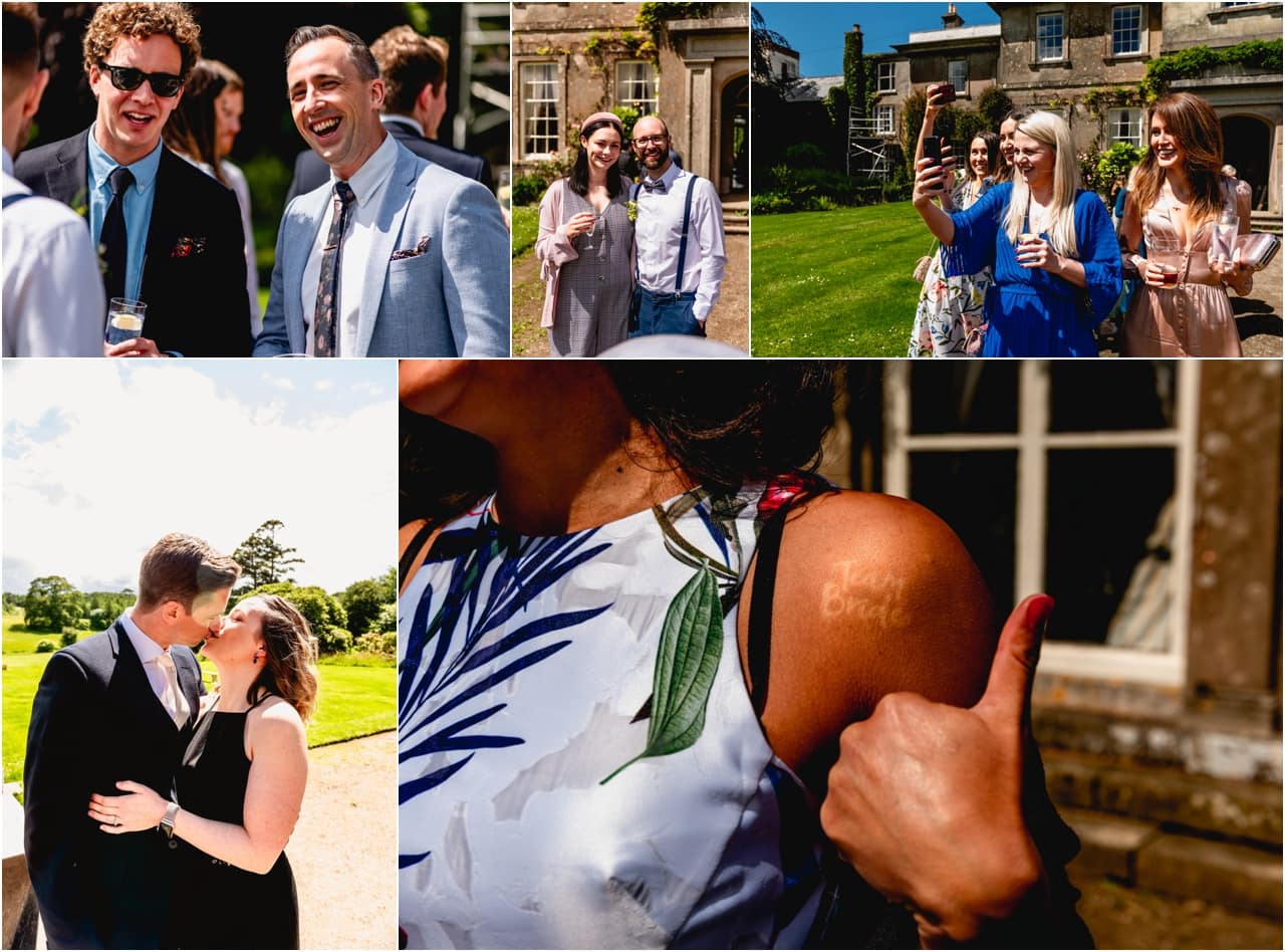 Guests enjoy a summer wedding on the ground of Buckland House.