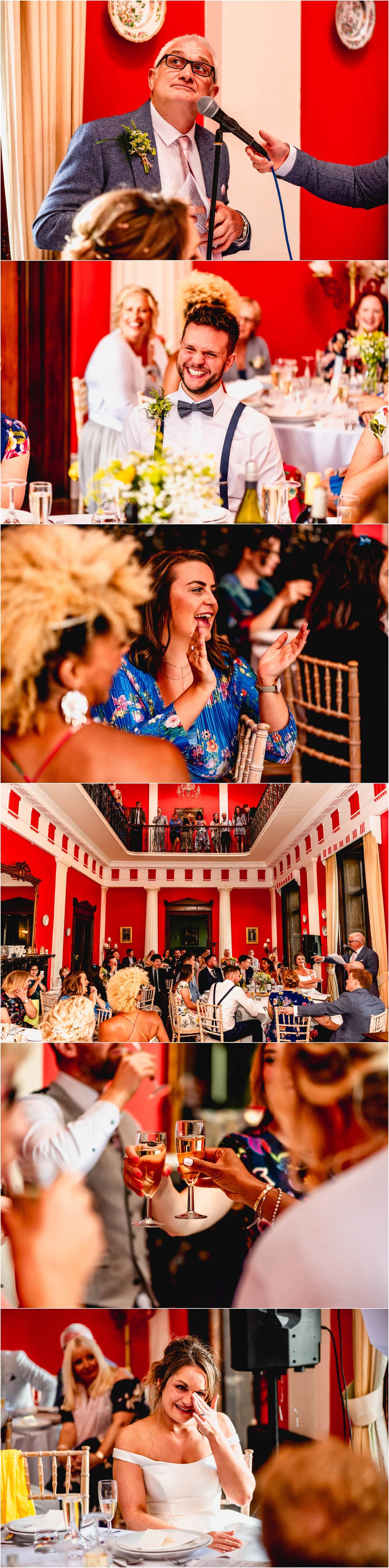 Wedding speeches in the red room of Buckland House in Devon.