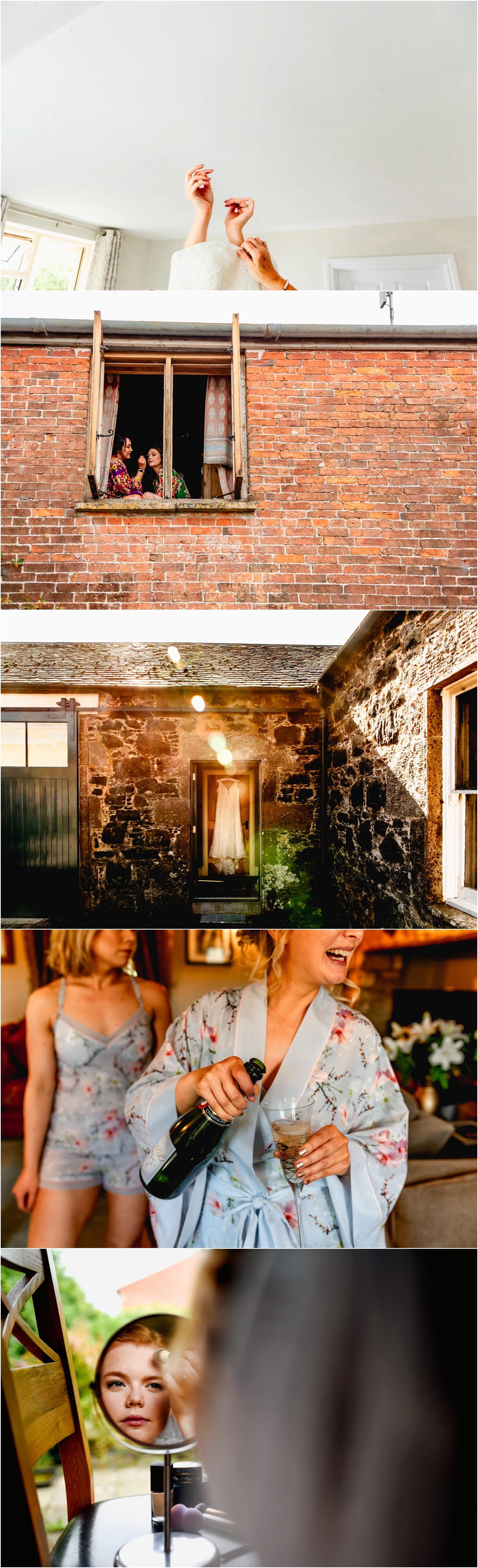 Bridal preparation with bridesmaids getting ready and wedding dress hanging in the doorway of a rustic cottage