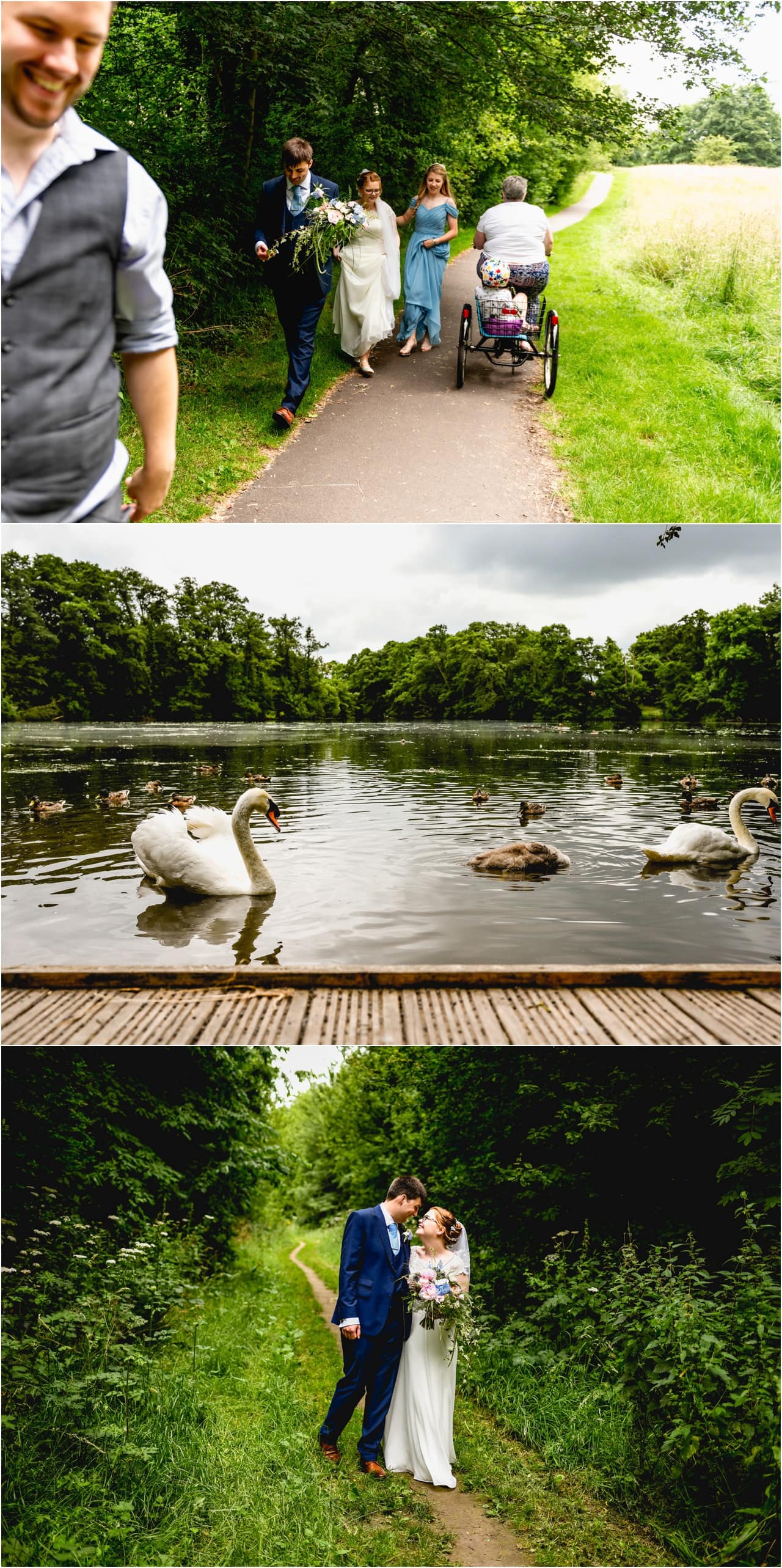 Bride and groom walk down country path past a child being towed along the path on a bike ; swans swimming in the pond.