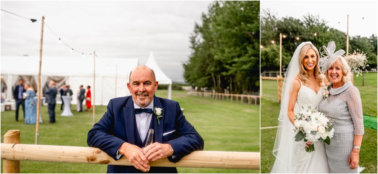 Parents of the bride and groom celebrate their daughters wedding at home in a marquee in Sutton Coldfield.