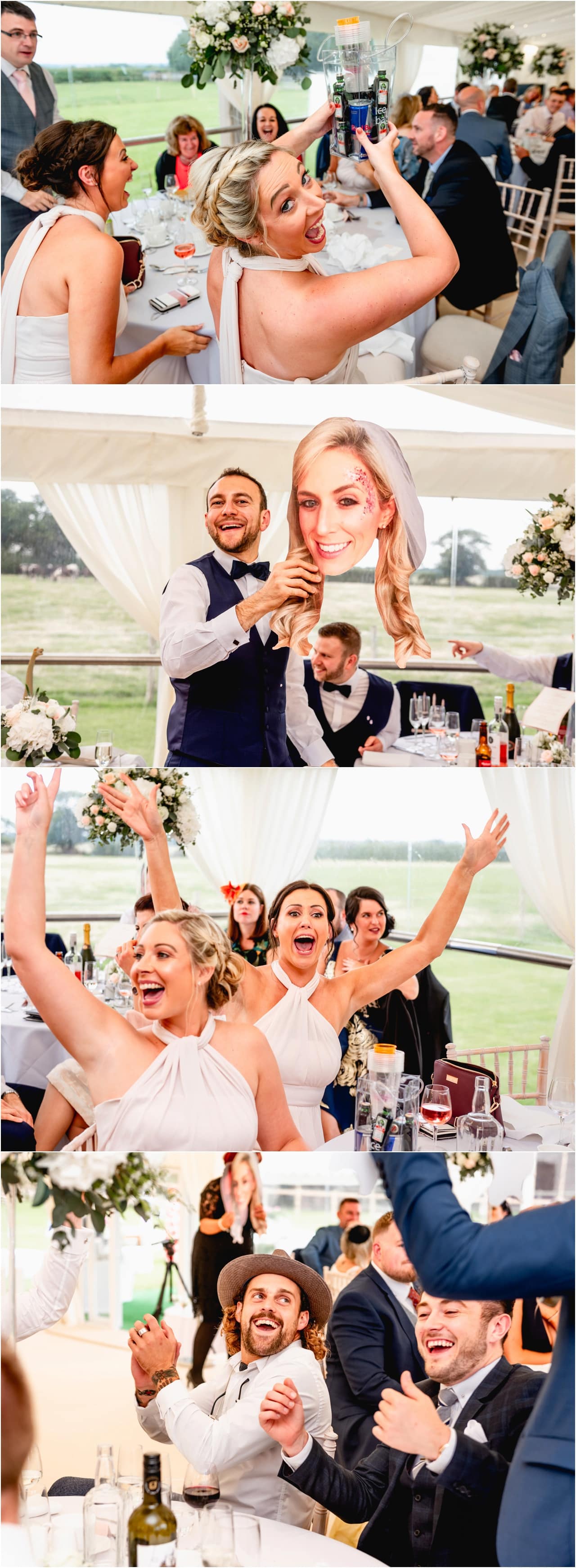 Guests play a game at a wedding in Sutton Coldfield holding large cardboard photos of bride and grooms heads to answer quiz about the happy couple.