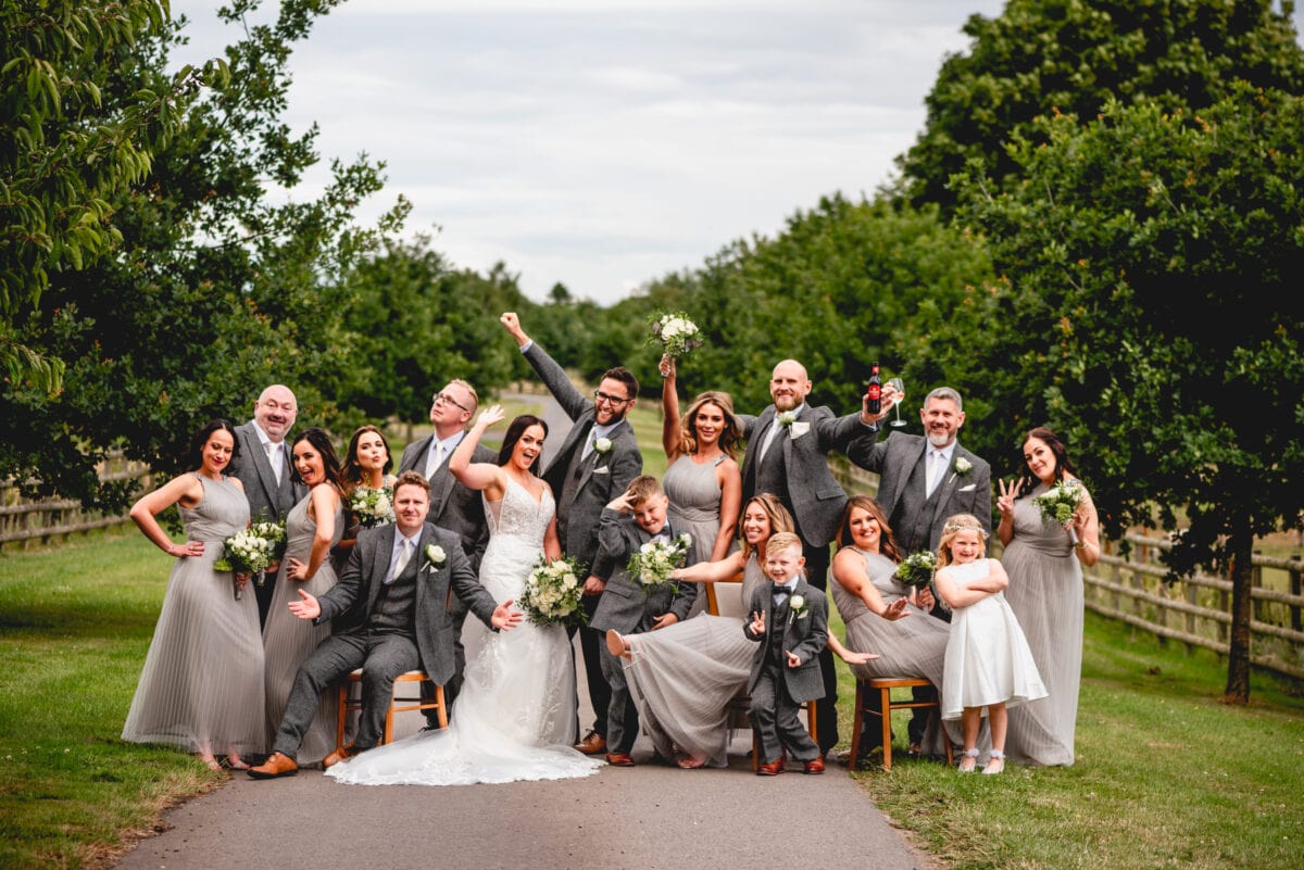 Bridal squad party at Mythe Barn on driveway to venue