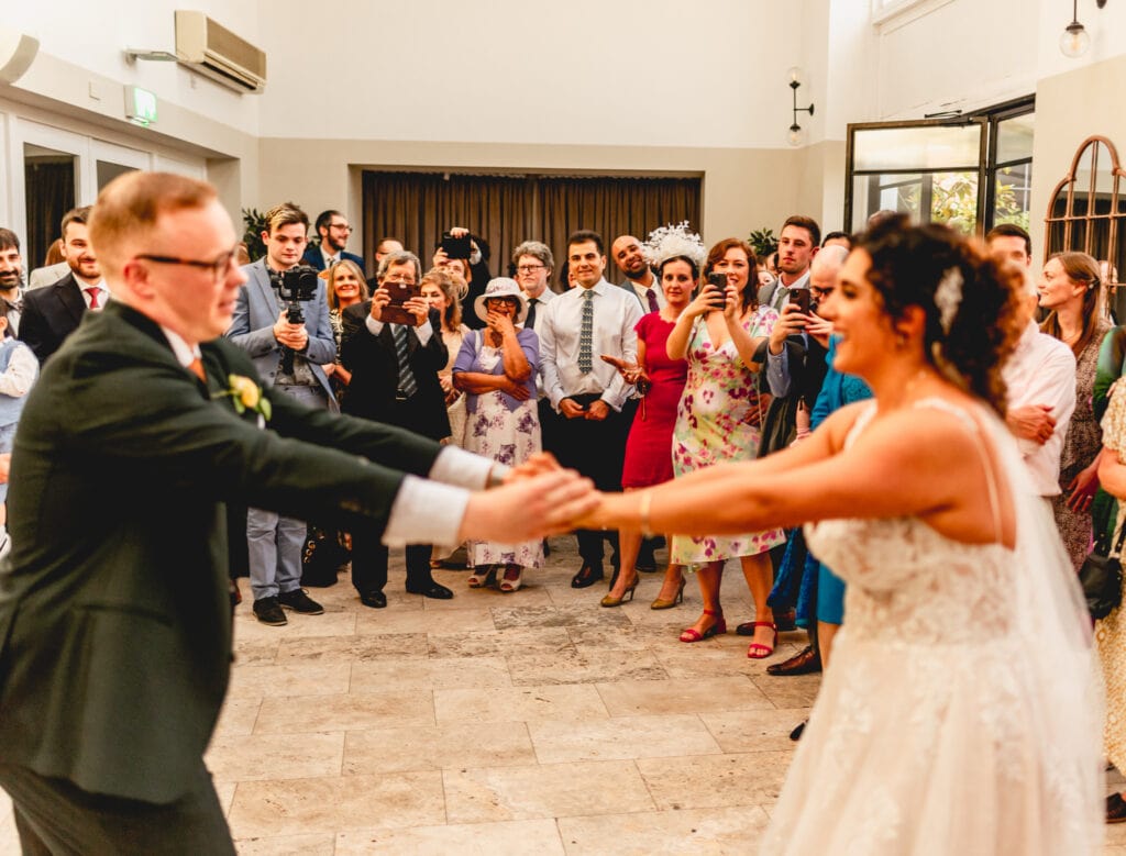 Bride and groom dance at Fazeley Studios during Iranian wedding ceremony