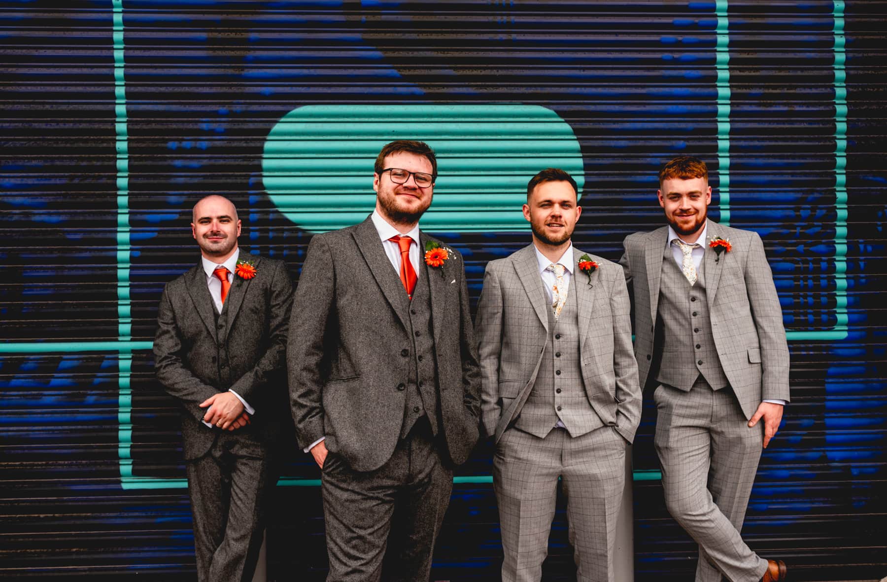 Groomsmen portrait in Digbeth against graffiti backdrop