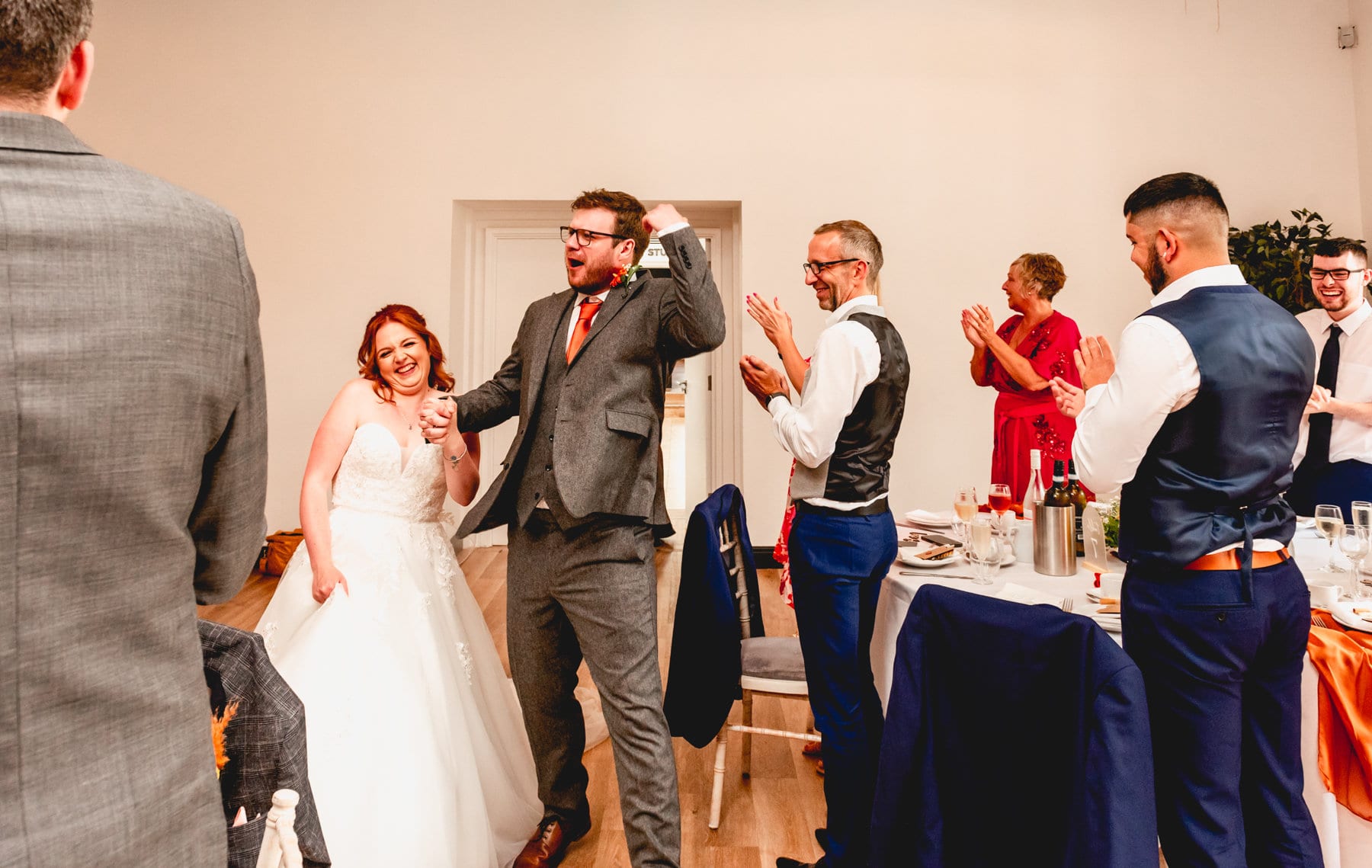 Couple enter wedding breakfast at Fazeley Studios to rounds of applause