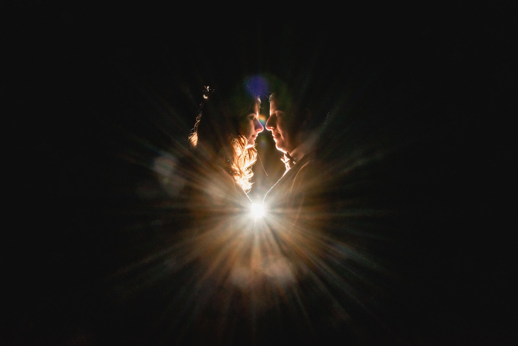 Creative lighting photography at Mythe Barn Wedding Venue