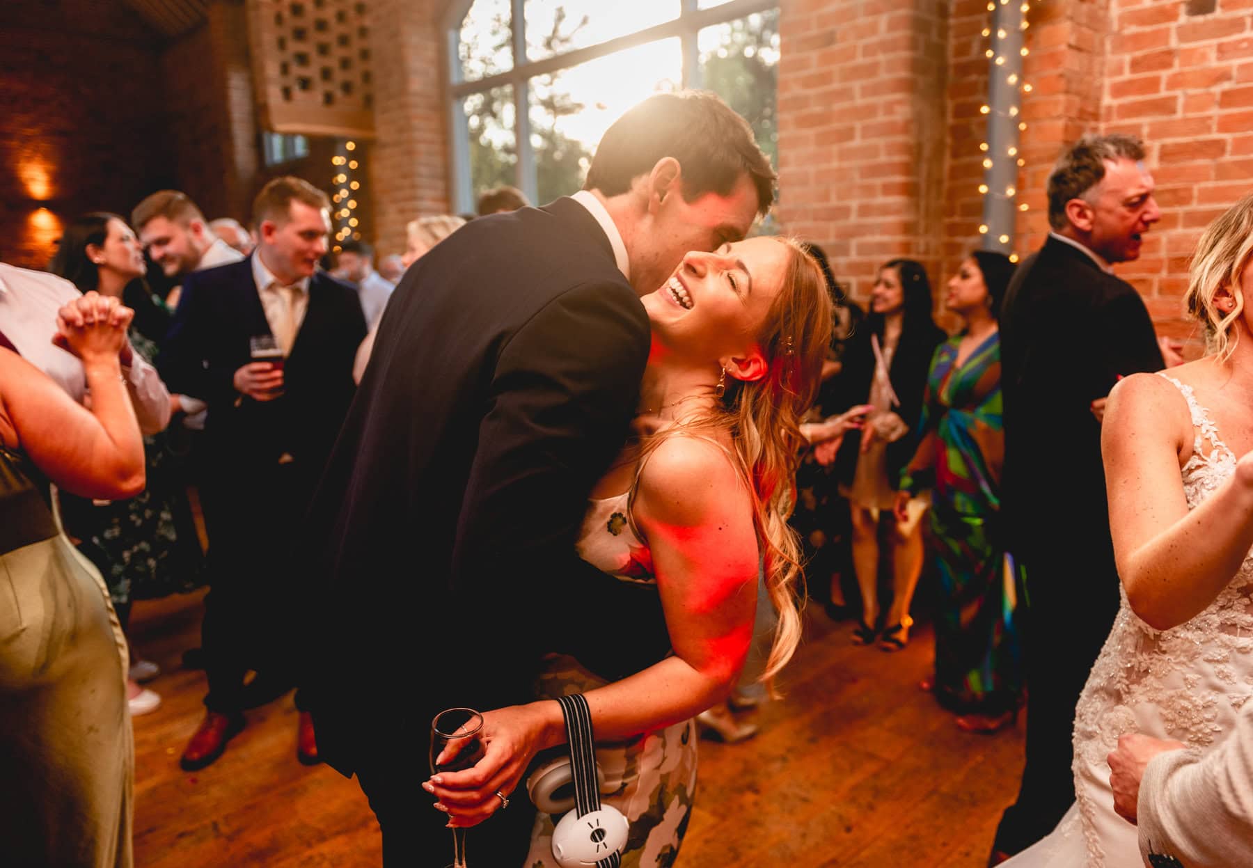 Couple dance during a wedding at Swallows Nest Barn