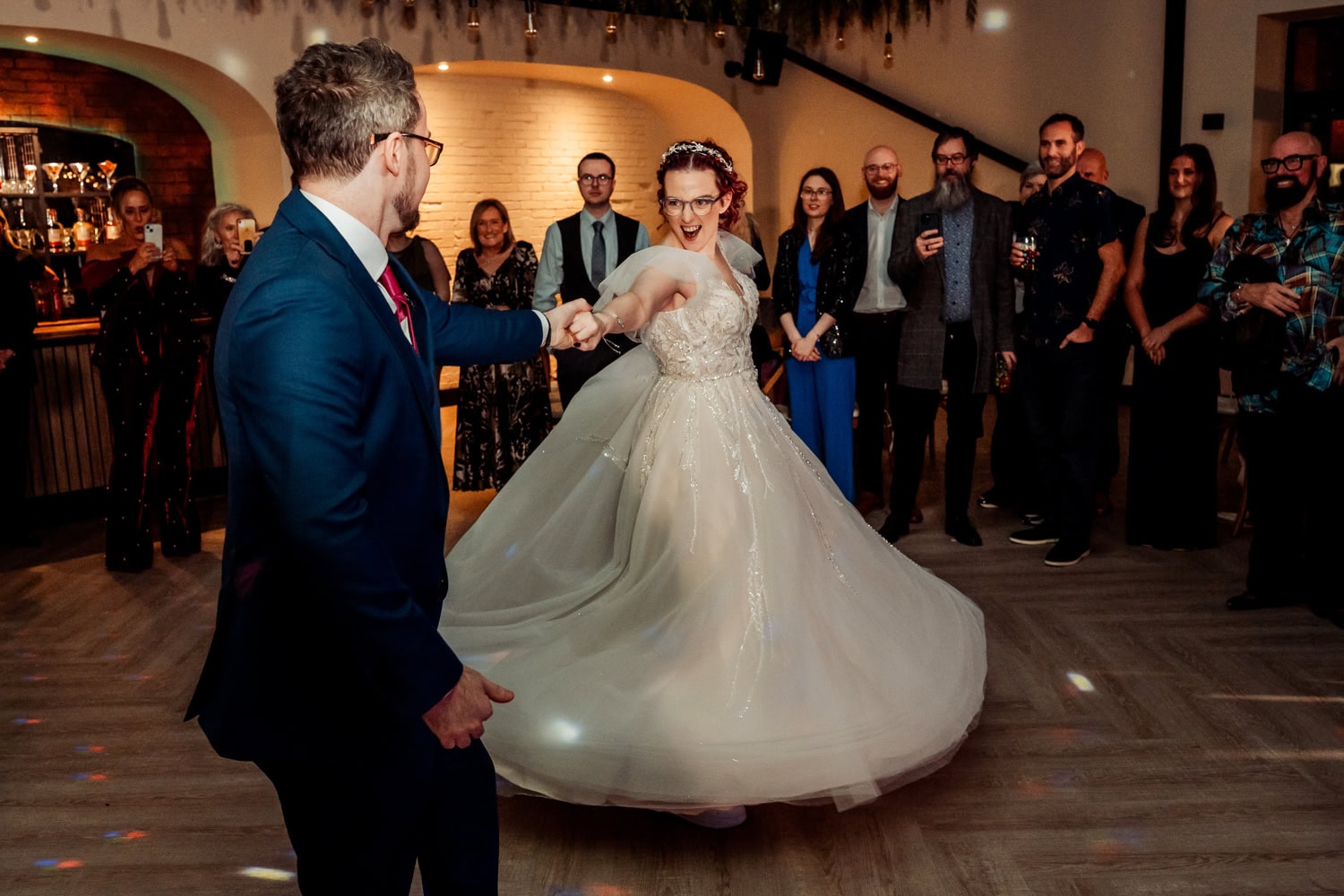 First dance at Blackbrook Barns wedding venue in Lichfield, Staffordshire with bride in glasses
