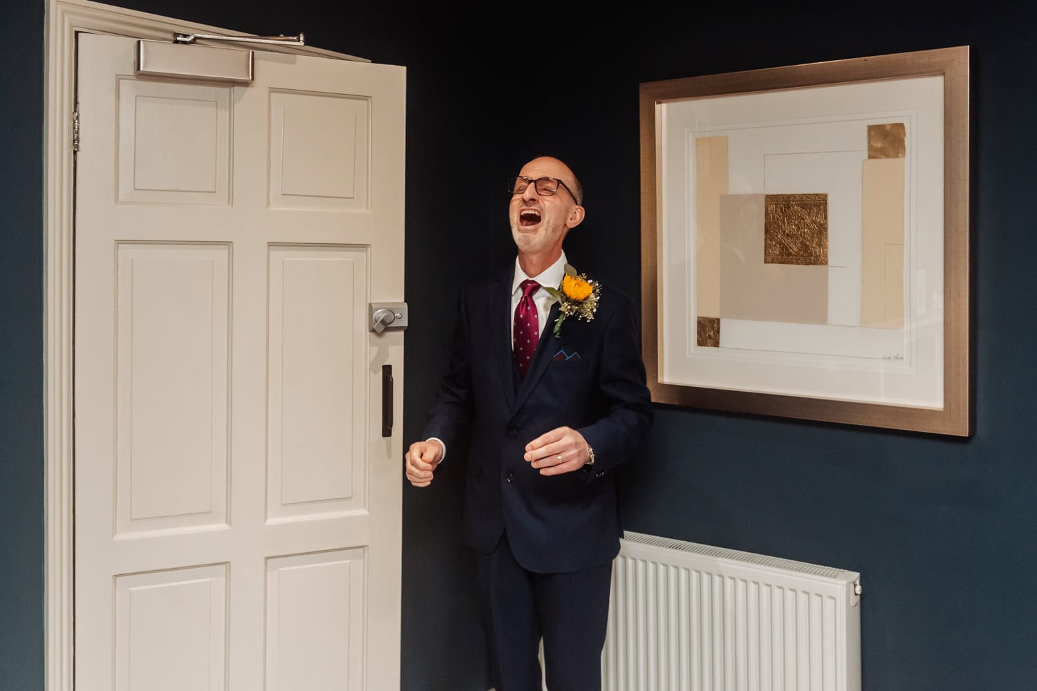 Father of Bride cries as he walks in the room to see bride for the first time